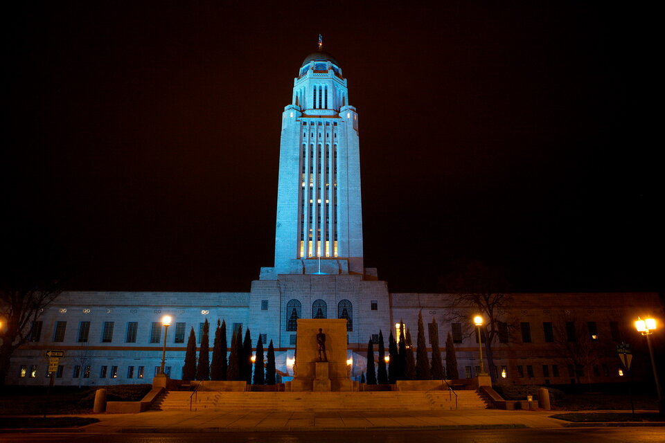 Lincoln Capital lit up at night.